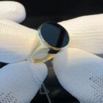 GDR-336 ovale dames zegelring 14 kt met onix gezet mt 18